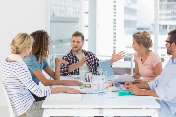Young design team having a meeting together in creative office