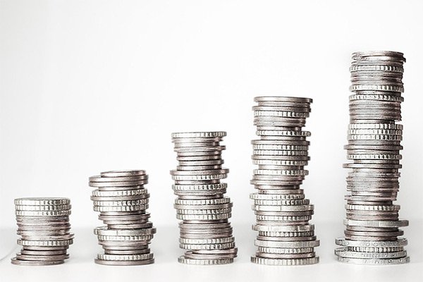 Coins stacked up side by side